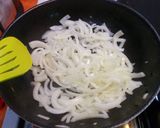 A picture of step 2 of Corn and rajas (pepper strips).