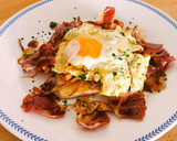 Foto del paso 5 de la receta: Tosta de Alcachofas fritas, Huevo roto y Jamón ibérico