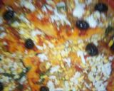 صورة لخطوة 4 من وصفة 🍕 بيتزا خفيفة واقتصادية
