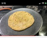 A picture of step 14 of Masala laccha paratha.