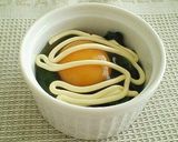 A picture of step 3 of Eggs en Cocotte (Shirred Eggs) with Spinach, Mayonnaise and Cheese.
