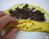 A picture of step 10 of Easy Crepes with Pancake Mix in a Frying Pan.