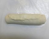A picture of step 9 of Melt in Your Mouth Round Bread with Heavy Cream.
