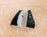 A picture of step 2 of Jiji (from Kiki's Delivery Service) Onigiri.