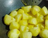 A picture of step 2 of Masala baby potatoes.