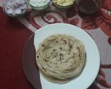 A picture of step 4 of Porotta egg roll.