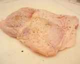 A picture of step 1 of Sautéed Chicken with Tomato Cream Sauce.