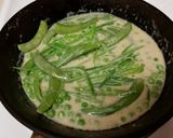 A picture of step 6 of Peas with Creamy Bacon Sauce.