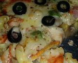 A picture of step 6 of Macaroni hot pizza cake.