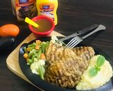 A picture of step 8 of Black pepper chicken steak.