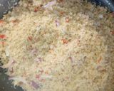 A picture of step 11 of Dambun shinkafa with cabbage.