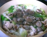 A picture of step 3 of Asari Clam and Chicken Drumette Salt and Butter Hot Pot.