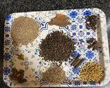 A picture of step 1 of Garammasala(all spices).