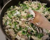 A picture of step 2 of Cheesy Chicken Alfredo stuffed shells.