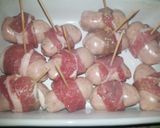 A picture of step 8 of Roast Chicken with stuffing and very fat pigs in blankets.