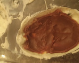 Foto del paso 5 de la receta: Huevo de Pascua oreo con cáscara rellena de dulce de leche