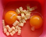 A picture of step 3 of Stir Fried Udon Noodles with Melting Cheese and Fluffy Eggs.