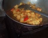 A picture of step 26 of Gujrati masala puri with aloo sabji.
