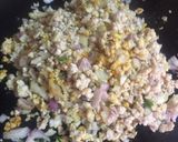 A picture of step 3 of Tawa chicken with onion.