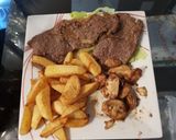A picture of step 2 of My Garlic Butter Sirloin Steak with mushrooms & thick cut Chips.