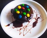 A picture of step 8 of Eggless chocolate cup cakes leftover metled icecream.