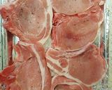 A picture of step 2 of Pork Chops with peppercorn sauce.