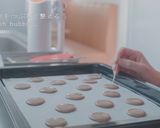 A picture of step 10 of PARISIAN MACARONS (chocolate macarons).