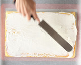 A picture of step 12 of Strawberry Swiss Roll Cake.