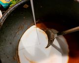 A picture of step 5 of Thai Red "Dragon" chicken soup.