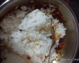 A picture of step 3 of Instant Carrot Tomato Rice.