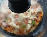 A picture of step 3 of Cheesy Chapati Pizza.