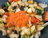 Une image de l'étape 5 de Courgettes farcies aux légumes.