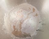 A picture of step 6 of Completely homemade chicken madras pizzas.