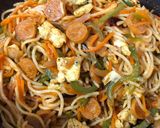 A picture of step 15 of Schezwan Egg Sausage Noodles.