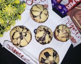 A picture of step 9 of Eggless marble cup cake.