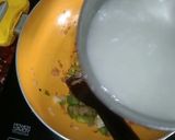 A picture of step 2 of Macroni In Tomato Sauce.