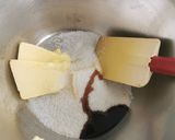A picture of step 2 of Blueberries and vanilla frosted cup cakes.