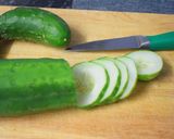A picture of step 1 of Sweet and sour pickled cucumber.