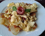 Foto del paso 5 de la receta: Revuelto de patatas con huevos y jamón