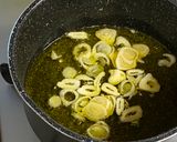 A picture of step 3 of Oyster pickled in Garlic Olive Oil.