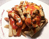 Foto del paso 15 de la receta: Tiras de muslos de pollo, con patatas fritas y huevos