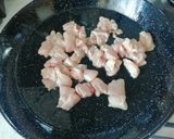 A picture of step 1 of Chicken Paella.