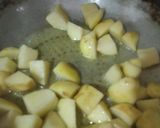A picture of step 1 of Aloo Gobi Matar Sabzi (Potato, Cauliflower, and Pea Curry).