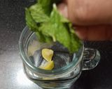 A picture of step 1 of Orange mojito.