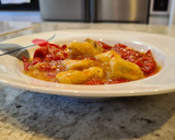 Foto del paso 5 de la receta: Salteado de pollo con pimientos del piquillo al ajillo