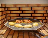 Foto del paso 4 de la receta: Cuarto trasero de pollo marinado con patatas asadas