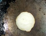 A picture of step 9 of Chitau Pitha with Coconut(Appam).