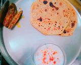 A picture of step 4 of Achari Parantha with lauki ka raita & mango pickle.