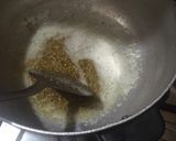 A picture of step 1 of Gur walay chawal.