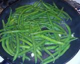 A picture of step 3 of Garlic and Parmesan Sauteed Green beans.